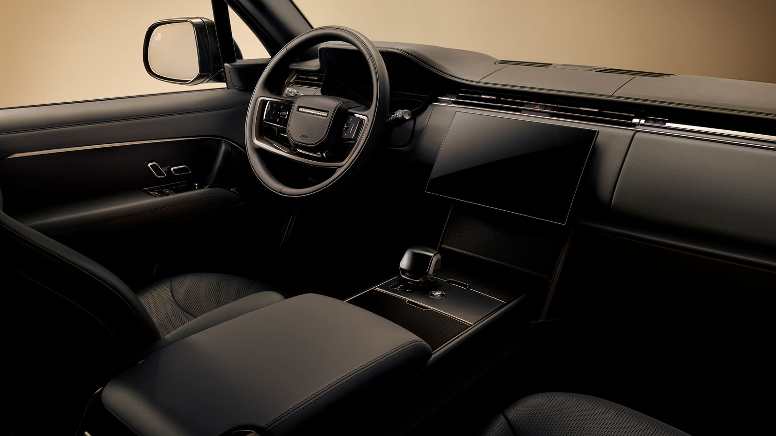 Không gian nội thất màu Ebony và chi tiết gốm đen trên Range Rover SV Black.